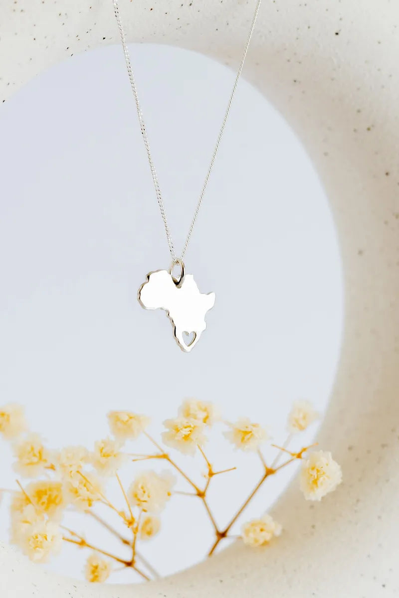 Africa Map Pendant with Heart Cutout - Image 1