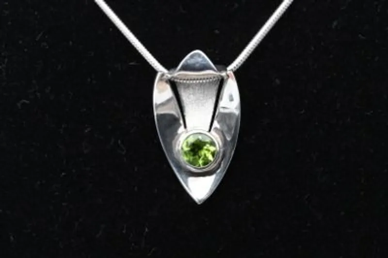 Oval Peridot Pendant in Sterling Silver - Image 1