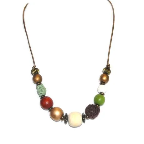 Assorted beads on metallic bronze leather - NWE96