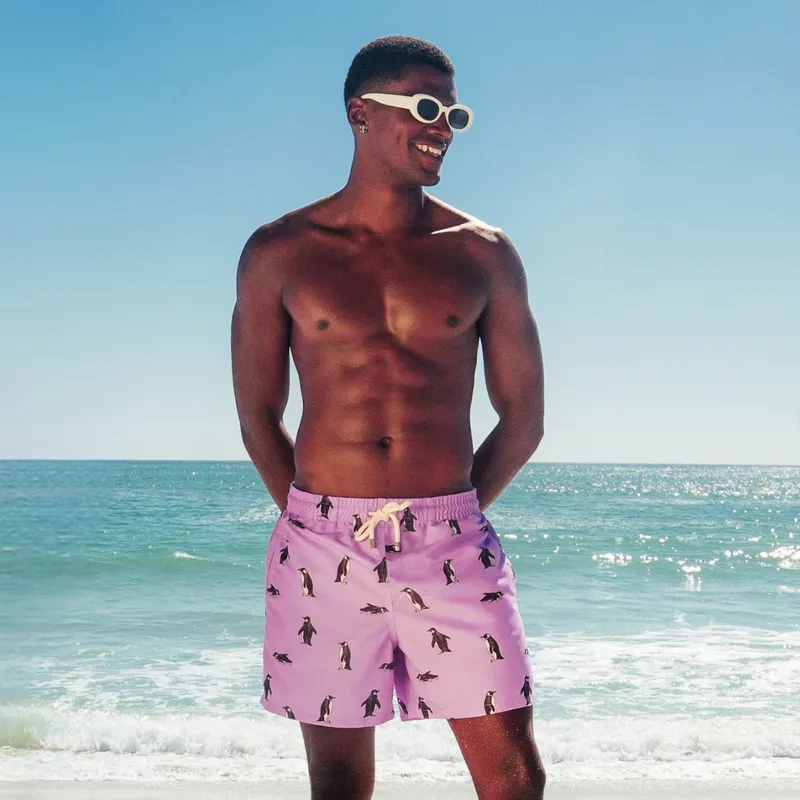 Mid-length Swim Shorts | Penguins / Lilac - Image 1