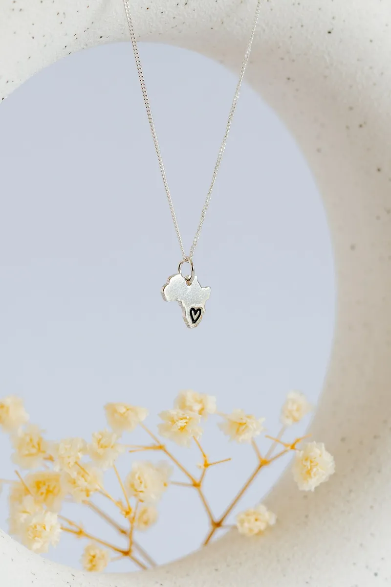 Solid Africa Map Pendant with Black Heart Design Engraved - Image 1