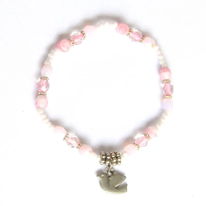 Selection of pink glass beads with dove symbol - BRSF20A