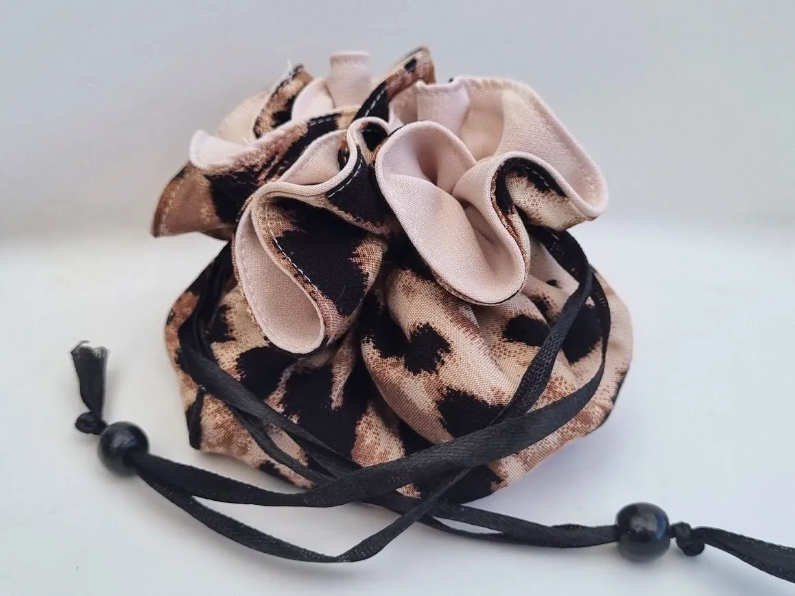 A light and compact travel cheetah print jewellery bag – JB10