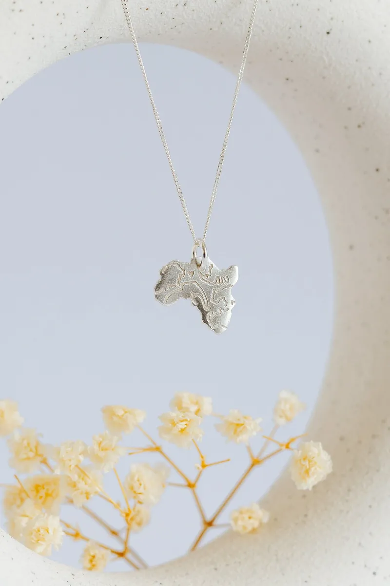 Africa Pendant Featuring Buffalo, Elephant, Leopard, Lion, Rhino Engraving - Image 1