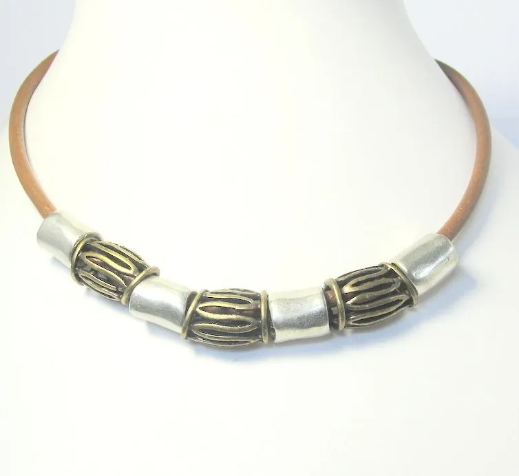 Stunningly textured metal beads a leather necklace  - NWE160
