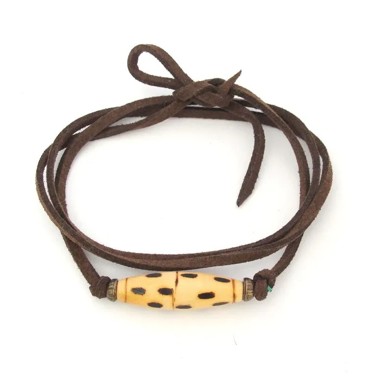 Spotted oval burnt wood on faux suede wrap bracelet - BRE135