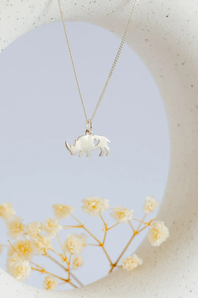 Rhino Pendant with Heart Cutout - Image 1