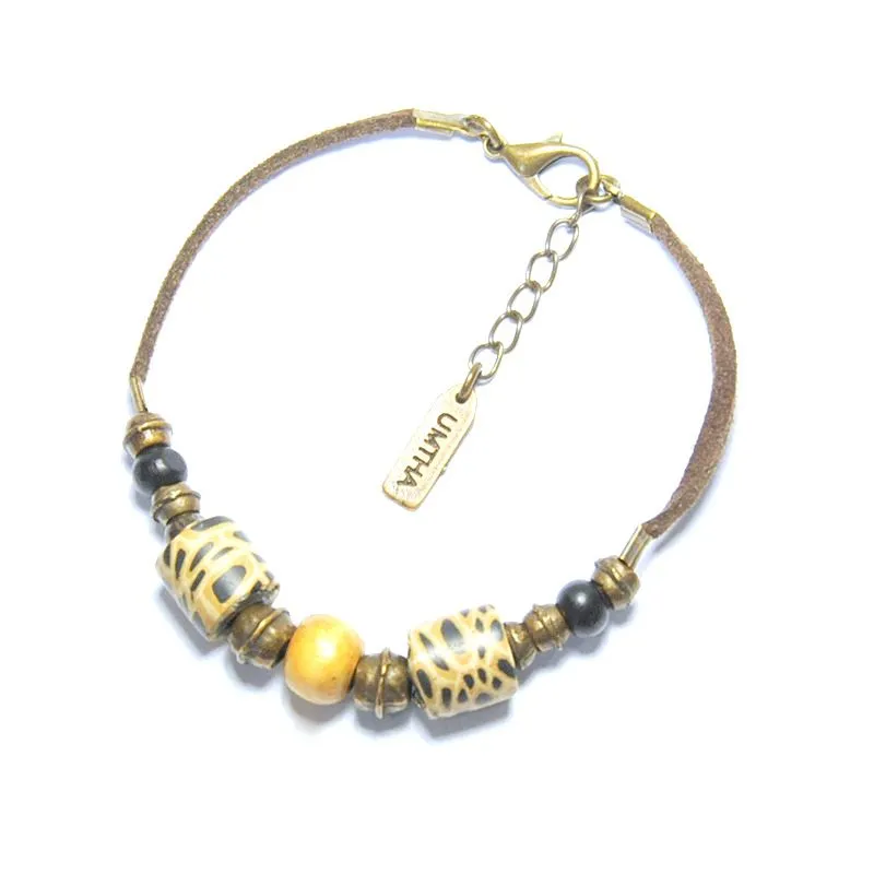 Animal skin polymer clay with bone/wood & antique brass beads on suede bracelet - BRLL