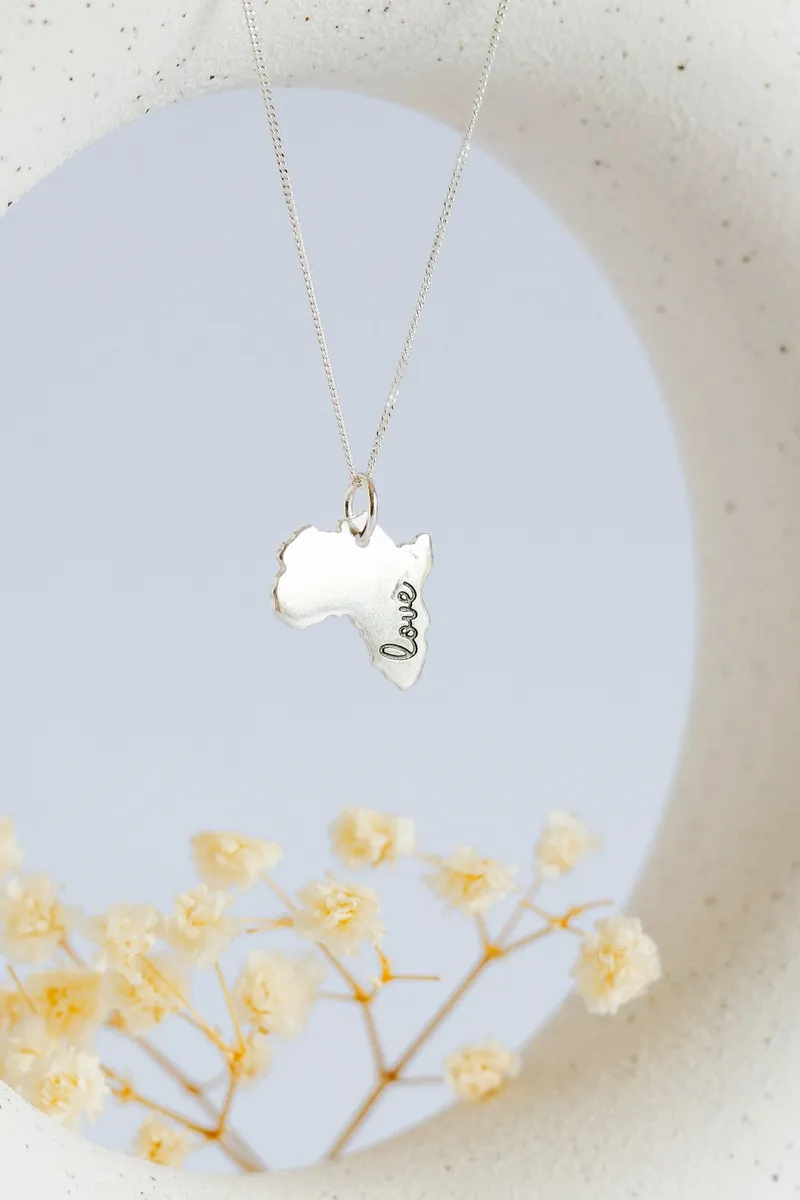 Solid Africa Map Pendant with "Love" Engraved - Image 1