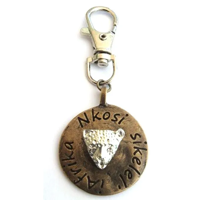 Leopard image on antique brass disc with bag clip attachment - BC03
