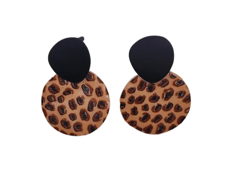 Earrings made with black iron studs and leopard print polymer clay discs - ERAS21